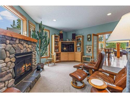 21 Blue Grouse Ridge, Canmore, AB - Indoor Photo Showing Living Room With Fireplace