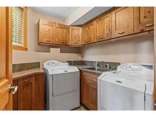 21 Blue Grouse Ridge, Canmore, AB - Indoor Photo Showing Laundry Room