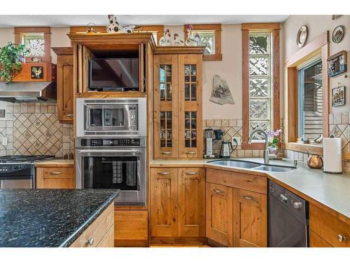 21 Blue Grouse Ridge, Canmore, AB - Indoor Photo Showing Kitchen With Double Sink