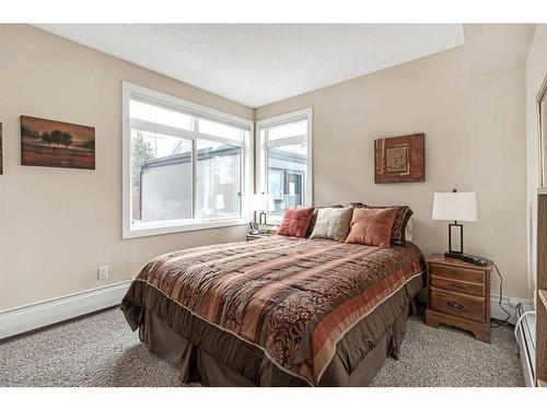 105-15207 1 Street Se, Calgary, AB - Indoor Photo Showing Bedroom