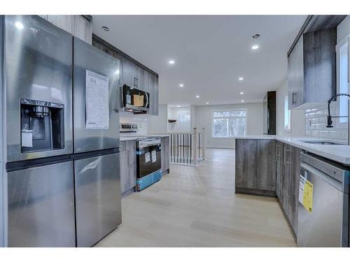26 Dovercliffe Close Se, Calgary, AB - Indoor Photo Showing Kitchen With Upgraded Kitchen