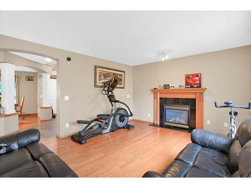 128 West Creek Pond, Chestermere, AB - Indoor Photo Showing Gym Room