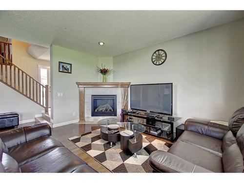 116 Kincora Hill Nw, Calgary, AB - Indoor Photo Showing Living Room With Fireplace
