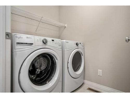 28 Cornerbrook Way Ne, Calgary, AB - Indoor Photo Showing Laundry Room