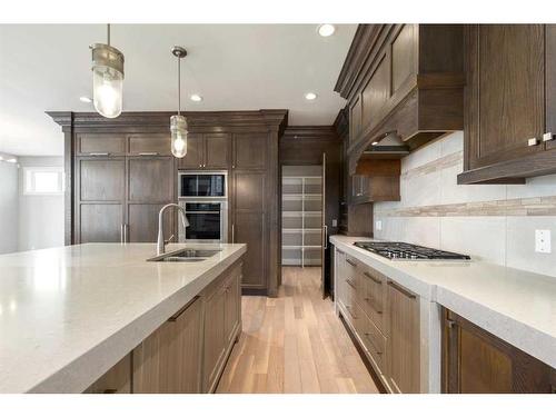 7 Aspen Summit Court Sw, Calgary, AB - Indoor Photo Showing Kitchen With Double Sink With Upgraded Kitchen