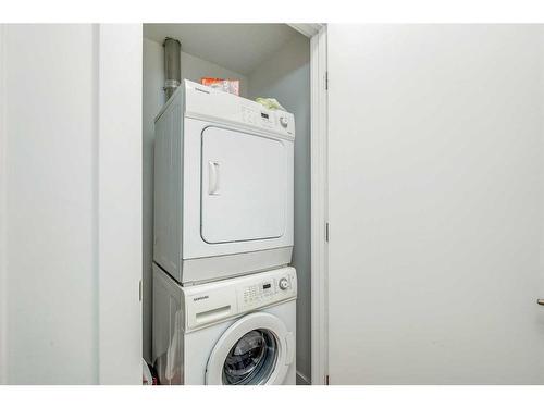 1507-8880 Horton Road Sw, Calgary, AB - Indoor Photo Showing Laundry Room