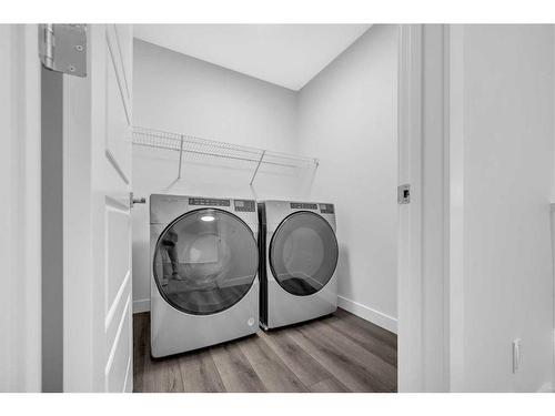 140 Hotchkiss Way Se, Calgary, AB - Indoor Photo Showing Laundry Room
