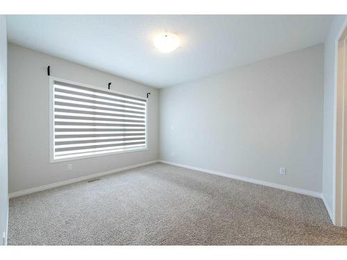 146 Wolf Creek Rise Se, Calgary, AB - Indoor Photo Showing Other Room