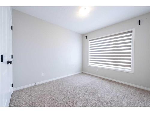 146 Wolf Creek Rise Se, Calgary, AB - Indoor Photo Showing Other Room