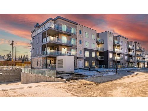 111-200 Shawnee Square Sw, Calgary, AB - Outdoor With Facade