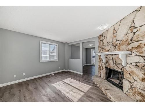 111 Pinemill Mews Ne, Calgary, AB - Indoor With Fireplace