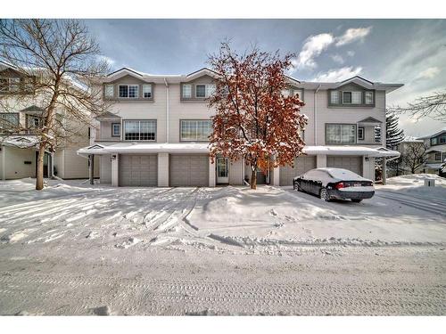 12 Kingsland Villas Sw, Calgary, AB - Outdoor With Facade