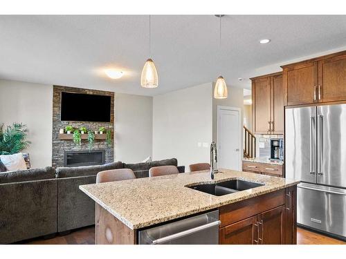 203 Boulder Creek Bay Se, Langdon, AB - Indoor Photo Showing Kitchen With Stainless Steel Kitchen With Double Sink