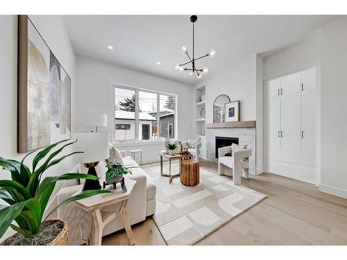 3028 27 Street Sw, Calgary, AB - Indoor Photo Showing Living Room With Fireplace