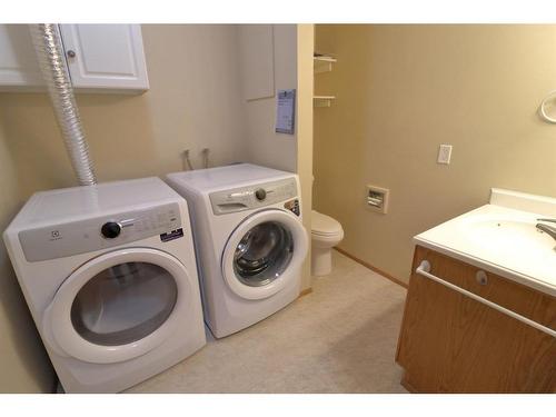 13 Chinook Crescent West, Claresholm, AB - Indoor Photo Showing Laundry Room