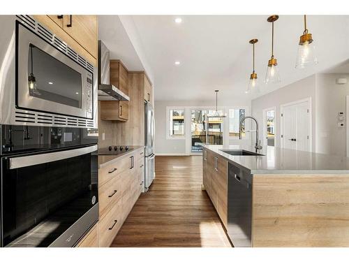 229 Precedence View, Cochrane, AB - Indoor Photo Showing Kitchen With Upgraded Kitchen