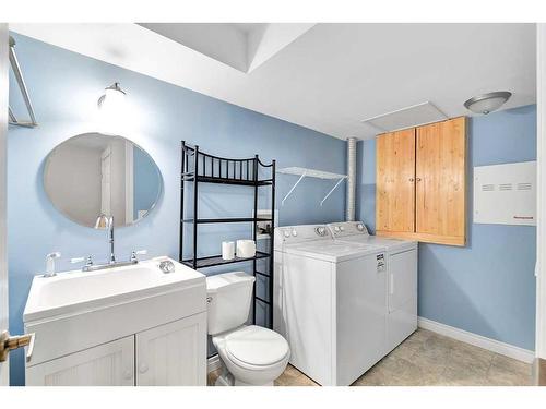51 Everbrook Link Sw, Calgary, AB - Indoor Photo Showing Laundry Room
