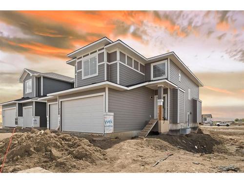 715 Mandalay Link, Carstairs, AB - Outdoor With Facade