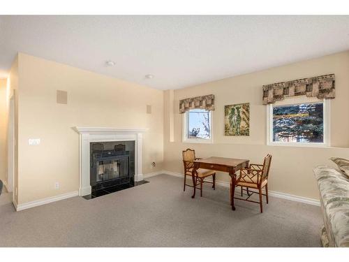 63 Prominence Point Sw, Calgary, AB - Indoor Photo Showing Living Room