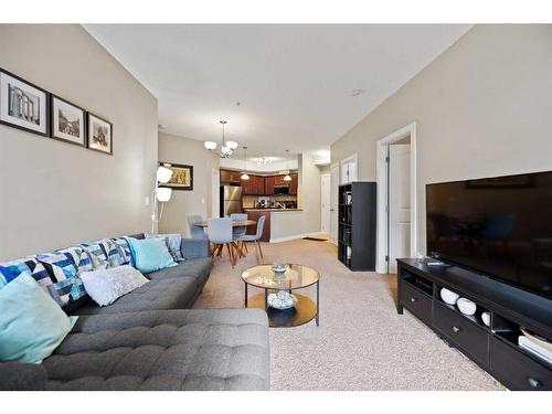 112-15304 Bannister Road Se, Calgary, AB - Indoor Photo Showing Living Room