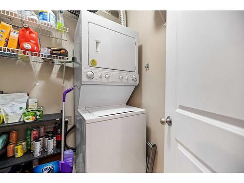 112-15304 Bannister Road Se, Calgary, AB - Indoor Photo Showing Laundry Room