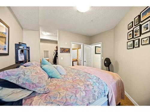 112-15304 Bannister Road Se, Calgary, AB - Indoor Photo Showing Bedroom