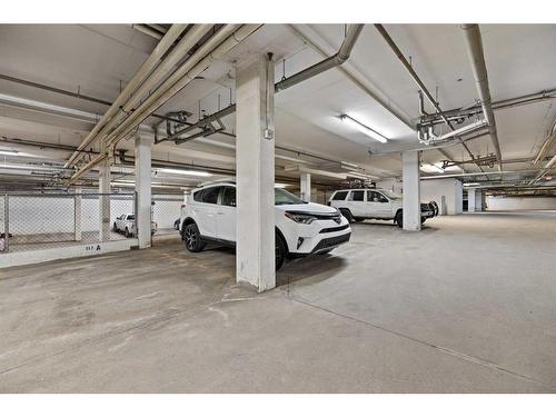 112-15304 Bannister Road Se, Calgary, AB - Indoor Photo Showing Garage