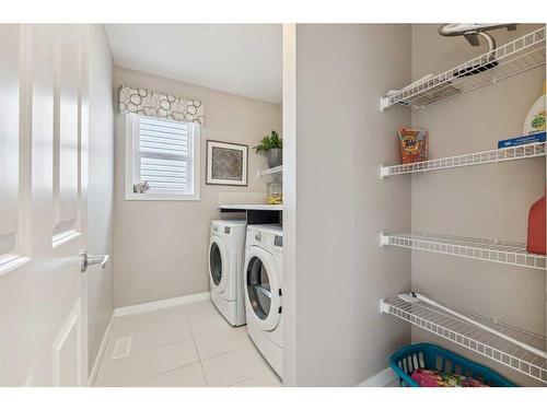 213 Walden Heights Se, Calgary, AB - Indoor Photo Showing Laundry Room