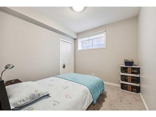 213 Walden Heights Se, Calgary, AB - Indoor Photo Showing Bedroom