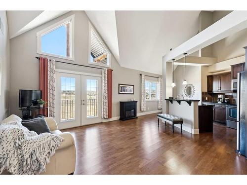 409-77 George Fox Trail, Cochrane, AB - Indoor Photo Showing Living Room