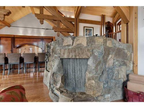 145 Silvertip Ridge, Canmore, AB - Indoor Photo Showing Other Room With Fireplace