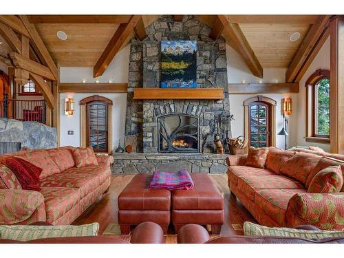 145 Silvertip Ridge, Canmore, AB - Indoor Photo Showing Living Room With Fireplace