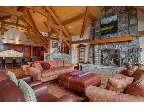 145 Silvertip Ridge, Canmore, AB - Indoor Photo Showing Living Room With Fireplace