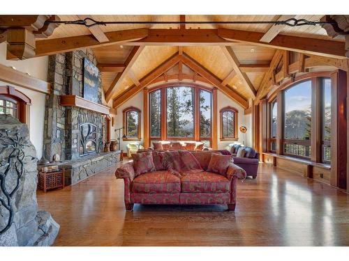 145 Silvertip Ridge, Canmore, AB - Indoor Photo Showing Living Room With Fireplace