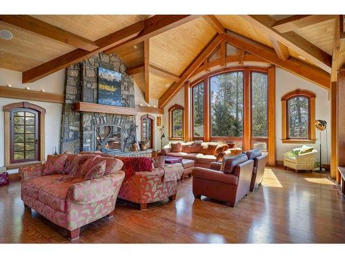 145 Silvertip Ridge, Canmore, AB - Indoor Photo Showing Living Room With Fireplace