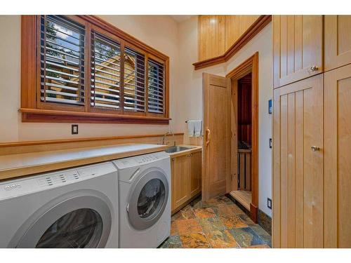 145 Silvertip Ridge, Canmore, AB - Indoor Photo Showing Laundry Room