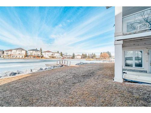 128 Coral Shores Cape Ne, Calgary, AB - Outdoor With Body Of Water