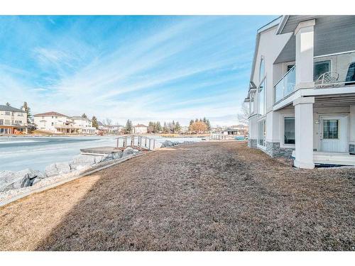 128 Coral Shores Cape Ne, Calgary, AB - Outdoor With Body Of Water
