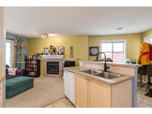 2-2318 17 Street Se, Calgary, AB - Indoor With Fireplace