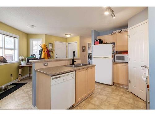 2-2318 17 Street Se, Calgary, AB - Indoor Photo Showing Kitchen With Double Sink
