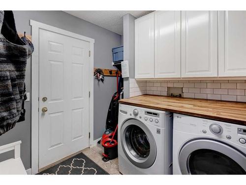 6 Gleneagles Terrace, Cochrane, AB - Indoor Photo Showing Laundry Room