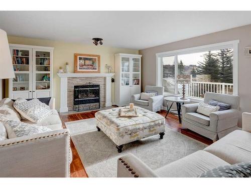 6 Gleneagles Terrace, Cochrane, AB - Indoor Photo Showing Living Room With Fireplace