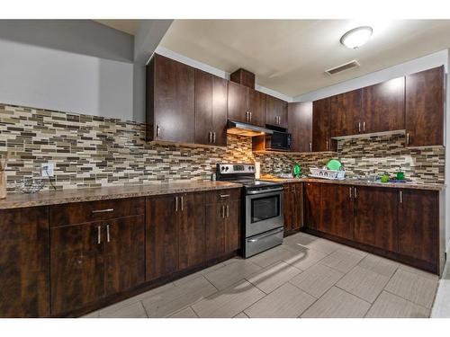 28 Saddlebrook Landing Ne, Calgary, AB - Indoor Photo Showing Kitchen With Upgraded Kitchen