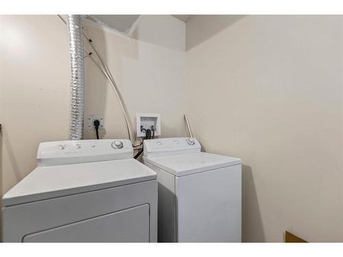 28 Saddlebrook Landing Ne, Calgary, AB - Indoor Photo Showing Laundry Room