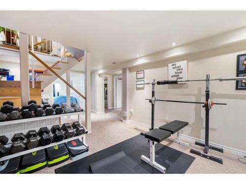 157 Wedgewood Drive Sw, Calgary, AB - Indoor Photo Showing Gym Room
