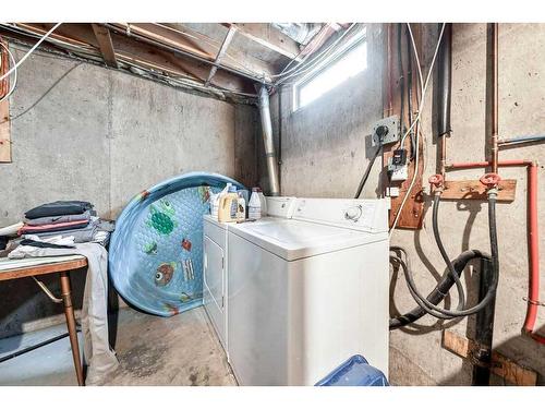 8019 20A Street Se, Calgary, AB - Indoor Photo Showing Laundry Room