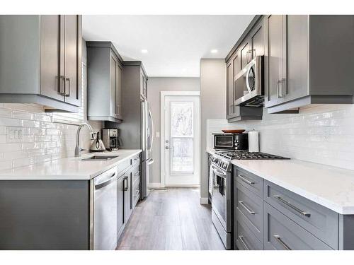 8019 20A Street Se, Calgary, AB - Indoor Photo Showing Kitchen With Upgraded Kitchen