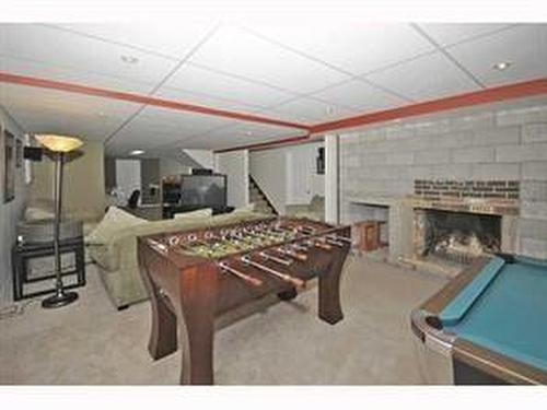 2758 85 Street Sw, Calgary, AB - Indoor Photo Showing Other Room With Fireplace