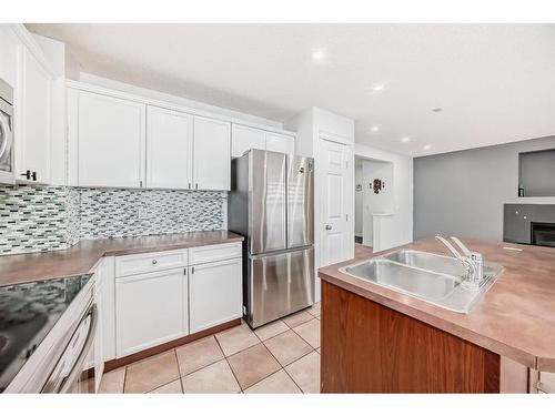 206 Saddlemont Boulevard Ne, Calgary, AB - Indoor Photo Showing Kitchen With Double Sink With Upgraded Kitchen