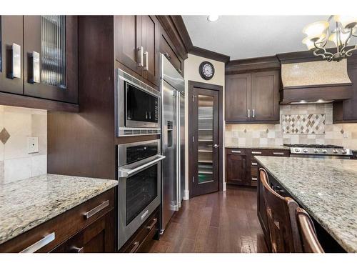 145 Aspen Glen Place Sw, Calgary, AB - Indoor Photo Showing Kitchen With Stainless Steel Kitchen With Upgraded Kitchen